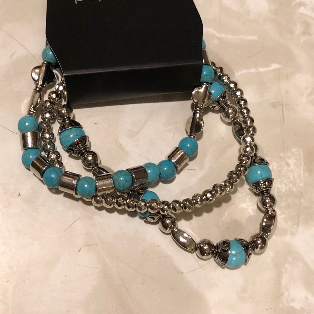 Turquoise and silver colored 3 piece bracelet set